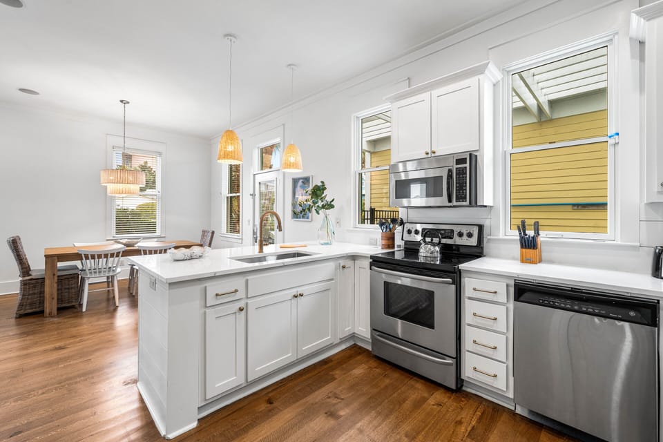 Newly Remodeled Fully Stocked Kitchen with Quartz Countertops, Stainless Steel Appliances & Walk-in Pantry