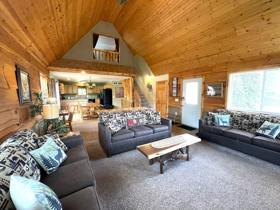 Living Room with Cozy Seating, Queen Sofa Sleeper, TV & Fireplace