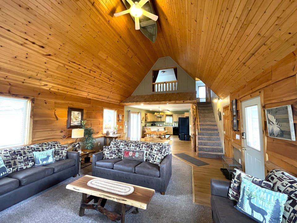 Living Room with Cozy Seating, Queen Sofa Sleeper, TV & Fireplace