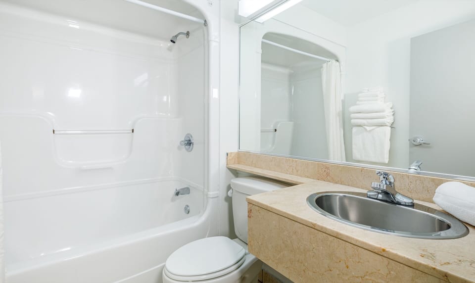 Eco-friendly toiletries, hair dryer, towels, soap