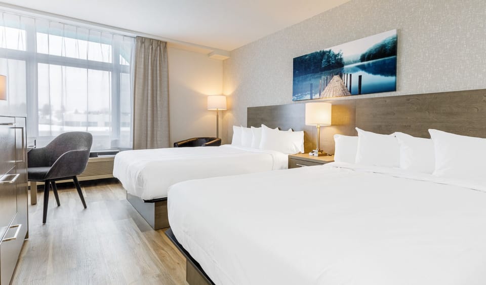 Standard Room, 2 Queen Beds | Desk, blackout drapes, soundproofing, iron/ironing board