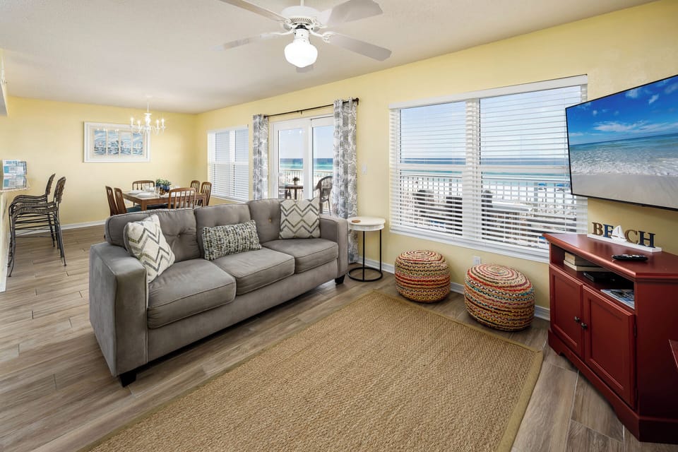Living Area - A great gathering place which features a pull-out sofa and large flat-screen TV.