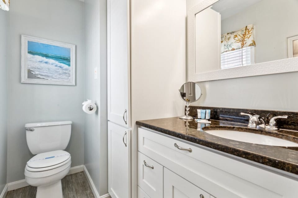 Here is the hall bathroom, which connects to the bedroom and hallway.