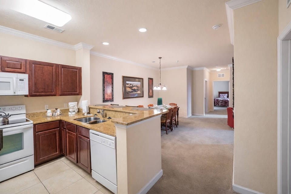 Walk into the full kitchen and dining area