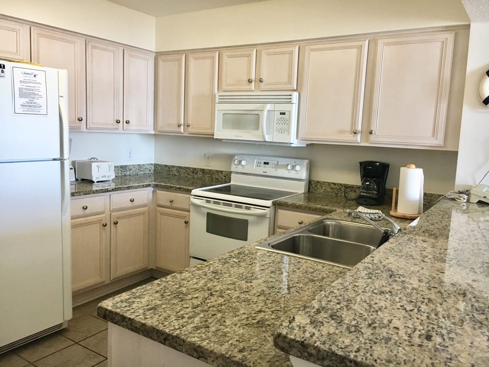 Kitchen - Fully Equipped kitchen to prepare your family meals or beach snacks.