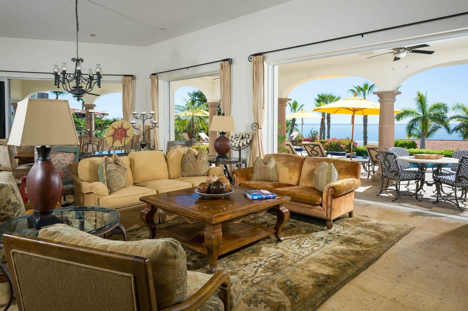 With wide windows instead of doors, it's easy to move from the outdoor terrace into the open-concept living and dining area