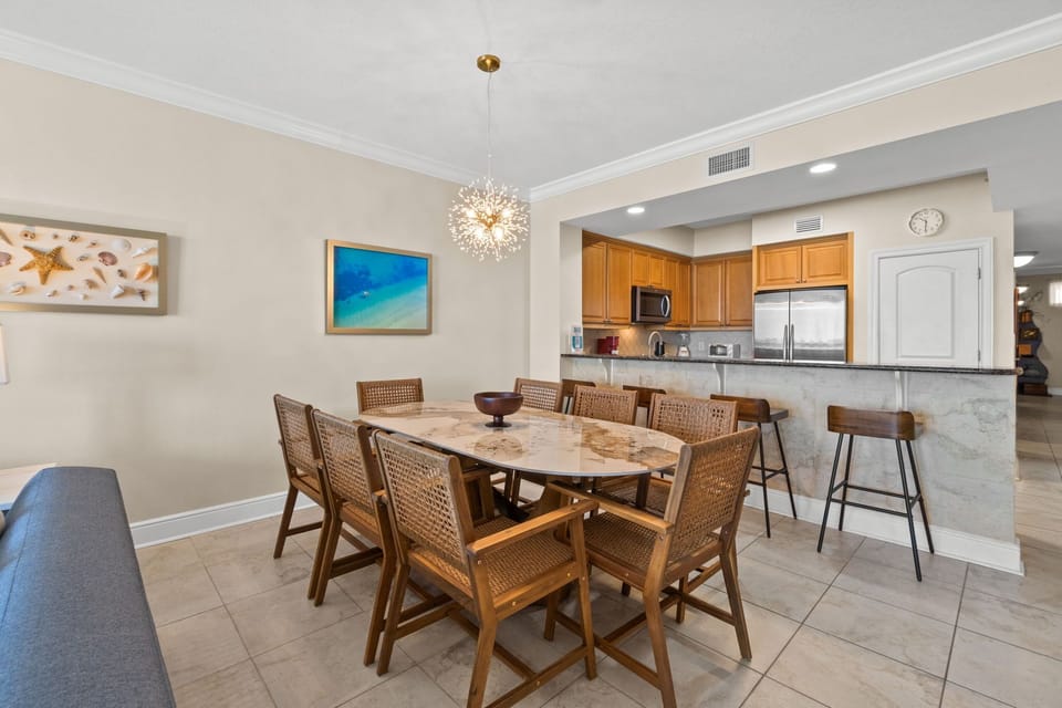 Dining Area - With additional seating at the breakfast bar.