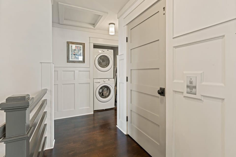 Washer and Dryer Close to Elevator on Third Level