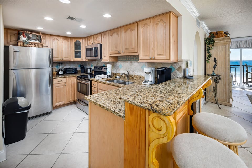 Kitchen - AMAZING must see kitchen. With stainless steel top of the line appliances and granite counter tops