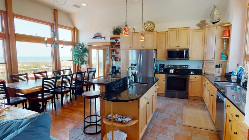 Updated appliances, granite counters.  WELL STOCKED kitchen.