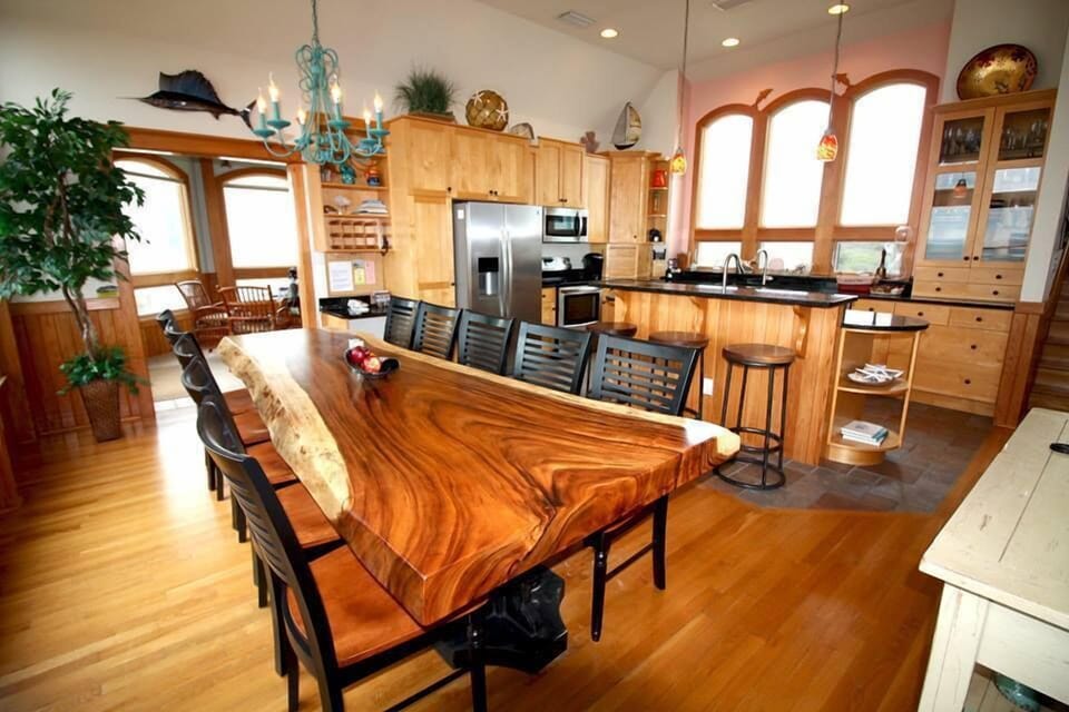 Kitchen, Dining and Sun Room - Beautiful Dining Table!  Sun room through doorway.