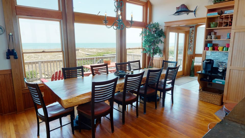 Dining with a view!!  Sunroom through the doorway! - Dining room with a view at Sands of Time vacation rental, Carova Beach 4x4 Northern Outer Banks NC
