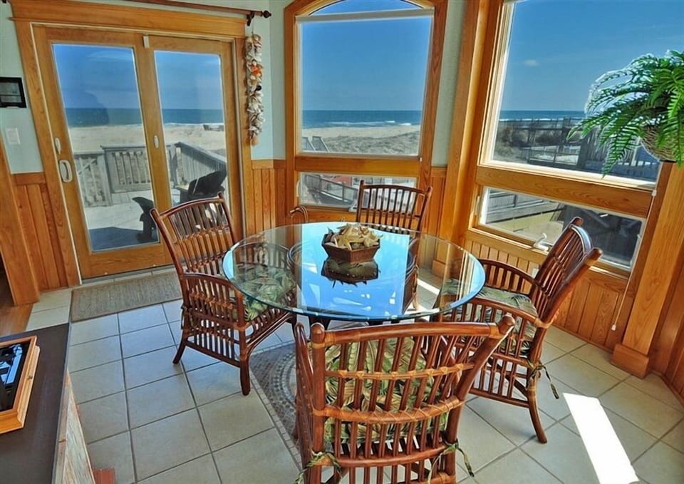 Sunroom - Located on the south side of the house just beyond the dining room, this room can be used for games, puzzles, or extra seating at dinner.