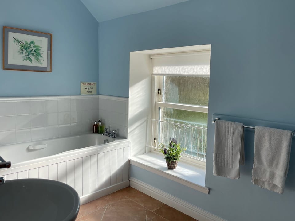 The family bathroom has bath there is also a family shower room