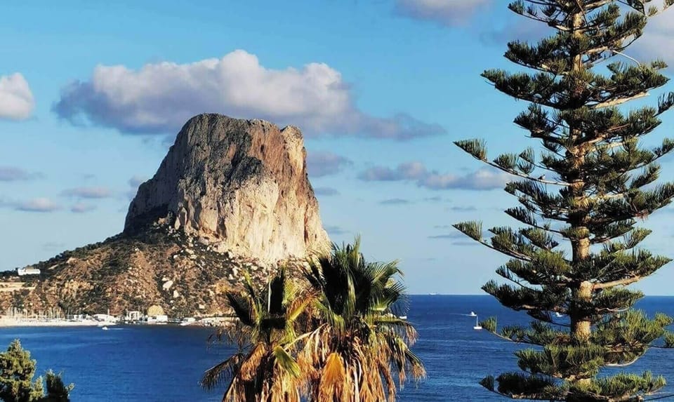 We are pleased to present you our beautiful holiday apartment with communal pool in Calpe, Costa Blanca. This apartment sleeps 4 people and has two bedrooms and two bathrooms.Inside the apartment, you will find a spacious living-dining room with TDT/SAT TV, air conditioning and access to the terrace. The kitchen is independent and fully equipped with a ceramic hob and dishwasher. The two bedrooms have a double bed each and also have air conditioning. One of the bedrooms has an en-suite bathroom with a bathtub. In addition, there is another bathroom with a shower.Outside, the apartment offers a pleasant area with a communal pool, Roman steps and outdoor shower, perfect for cooling off on hot summer days. There is also a tennis court available to guests, as well as a parking space for one vehicle.The location of the apartment is privileged, since it is close to the sea and all services. The nearest rock cove is just 750 meters away, and the restaurants and center of Calpe are 900 meters away. Furthermore, the nearest supermarket is just 350 meters from the apartment.Importantly, we offer free WiFi so you can stay connected during your stay. In addition, pets up to 12 kg are allowed with an additional fee.We hope you enjoy your stay in our beautiful holiday apartment with communal pool in Calpe. If you have any additional questions or need more information, do not hesitate to contact us.