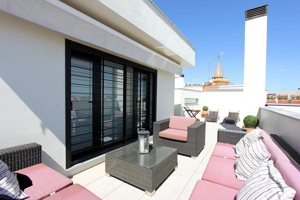 Terrace with garden furniture.