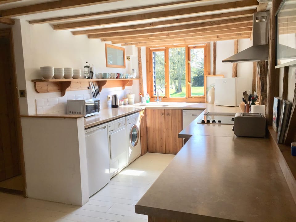 Alternate Kitchen shot with white goods and box freezer