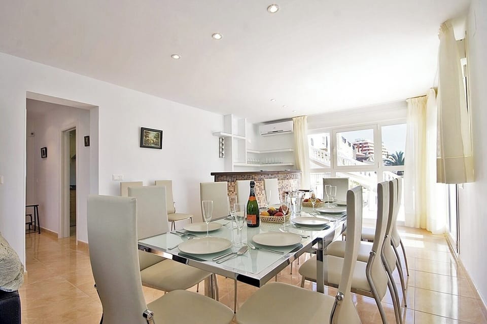 Pleasant summer villa with private pool in Calpe (Costa Blanca) for 12 people, with six bedrooms and four bathrooms, spread over two floors. It has air conditioning in the living room and in all bedrooms.INTERNAL: This villa consists of the GROUND FLOOR, which consists of a living-dining room with TV SAT/TDT, air conditioning, an American bar and access to the terrace and the pool. A fully equipped separate kitchen with dishwasher and ceramic hob. Two bedrooms each with a double bed. There is also a bathroom with a shower. The UPPER FLOOR consists of three bedrooms, each with two single beds, two of them with a bathroom with shower en suite. A double bedroom and finally a washroom.EXTERNAL: A large 10x5 pool fenced for child safety with roman steps and outside shower. There is also a built in barbecue and parking for 4 vehicles on the same property.LOCATION: Without a doubt, an unbeatable location, just 250 m from the nearest supermarket and restaurants. The sandy beach with all services is only 650 m away. There is also a cove 400 m away and Calpe town center 3 km away.REMARKS: Free wifi. Pets up to 12 kg are allowed at an additional cost.