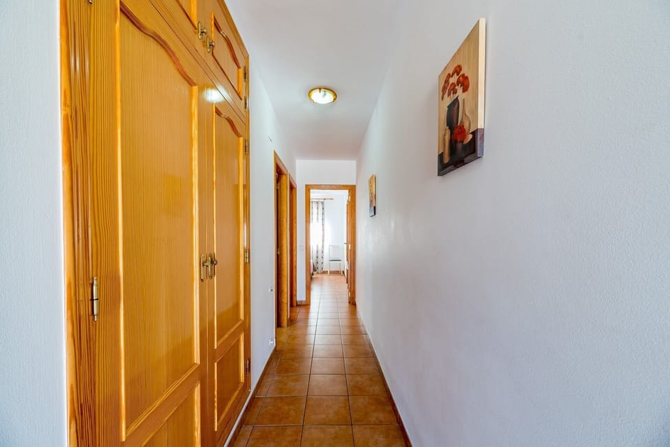 Beautiful villa with private pool located in Calpe (Costa Blanca), for 8 people with four bedrooms and two bathrooms distributed on a single floor (upper floor), since the lower one is closed and uninhabited.INTERIOR: Composed of living room with sat / tdt tv, and access to covered terrace and pool. Fully equipped independent kitchen with dishwasher and gas fires, a bedroom with two single beds, a separate bathroom with a bathtub, a bedroom with a double bed, a bedroom with two single beds, a separate bathroom with a bathtub and washing machine, and finally a bedroom With two single beds.EXTERIOR: It has a closed and partially wooded plot of 700 m² approx. You can enjoy the pool (8x4) of Roman stairs, outdoor shower, barbecue and space for sunbathing in the hammocks. Parking within the same plot for 3-4 vehicles.SITUATION: The villa is located in the urbanization Pla Senieta, quiet urbanization and a few meters from the center of Calpe (0.7 km), the sandy beach (beach and promenade arenal-bol 1.2 km), the shopping center and supermarket (0.7 km) and the tennis club and restaurant (0.4 km).OBSERVATIONS: Free WiFi. Pets are allowed up to 12 kg with supplement.