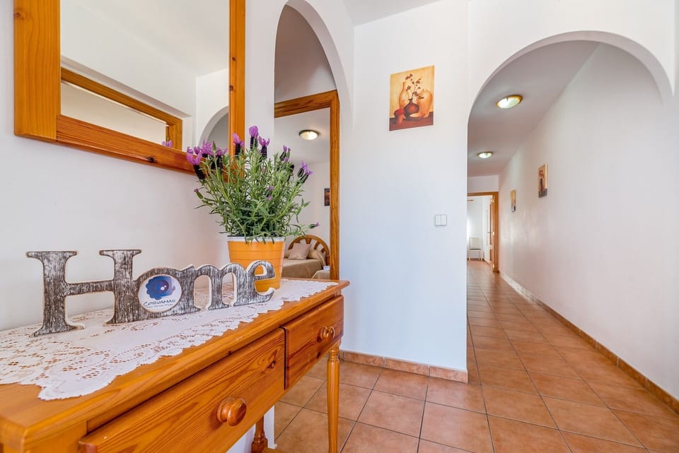 Beautiful villa with private pool located in Calpe (Costa Blanca), for 8 people with four bedrooms and two bathrooms distributed on a single floor (upper floor), since the lower one is closed and uninhabited.INTERIOR: Composed of living room with sat / tdt tv, and access to covered terrace and pool. Fully equipped independent kitchen with dishwasher and gas fires, a bedroom with two single beds, a separate bathroom with a bathtub, a bedroom with a double bed, a bedroom with two single beds, a separate bathroom with a bathtub and washing machine, and finally a bedroom With two single beds.EXTERIOR: It has a closed and partially wooded plot of 700 m² approx. You can enjoy the pool (8x4) of Roman stairs, outdoor shower, barbecue and space for sunbathing in the hammocks. Parking within the same plot for 3-4 vehicles.SITUATION: The villa is located in the urbanization Pla Senieta, quiet urbanization and a few meters from the center of Calpe (0.7 km), the sandy beach (beach and promenade arenal-bol 1.2 km), the shopping center and supermarket (0.7 km) and the tennis club and restaurant (0.4 km).OBSERVATIONS: Free WiFi. Pets are allowed up to 12 kg with supplement.