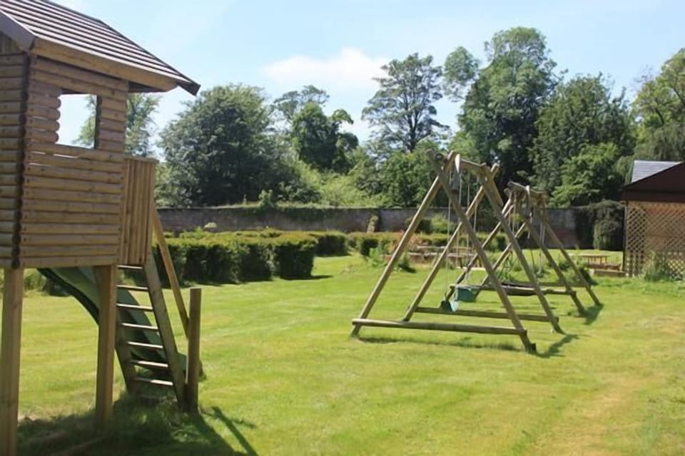 The walled garden play area is about 15 minutes walk from the West Lodge