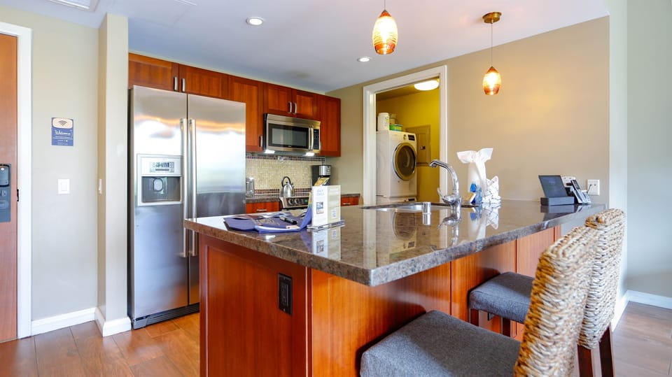 Featuring a full kitchen stocked with the essential items