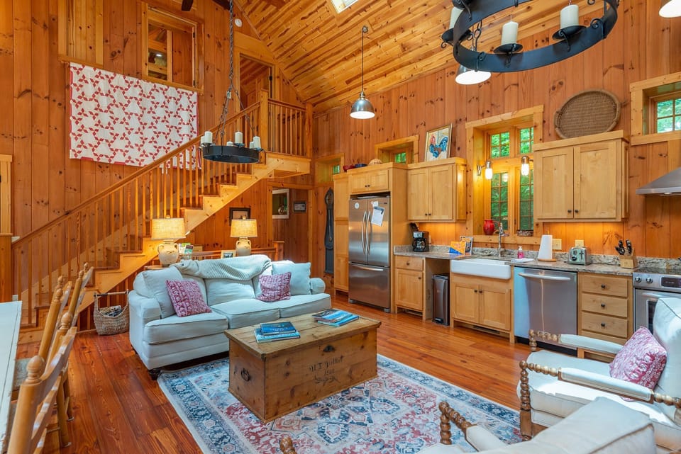 Open concept living, dining, and kitchen areas on the main level.