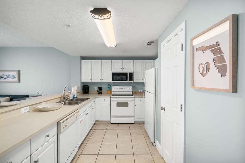 Fully Stocked Kitchen with Bar Seating