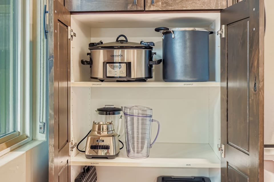 Your well-equipped kitchen features a slow cooker, stockpot, and blender for easy meal preparation during your stay.