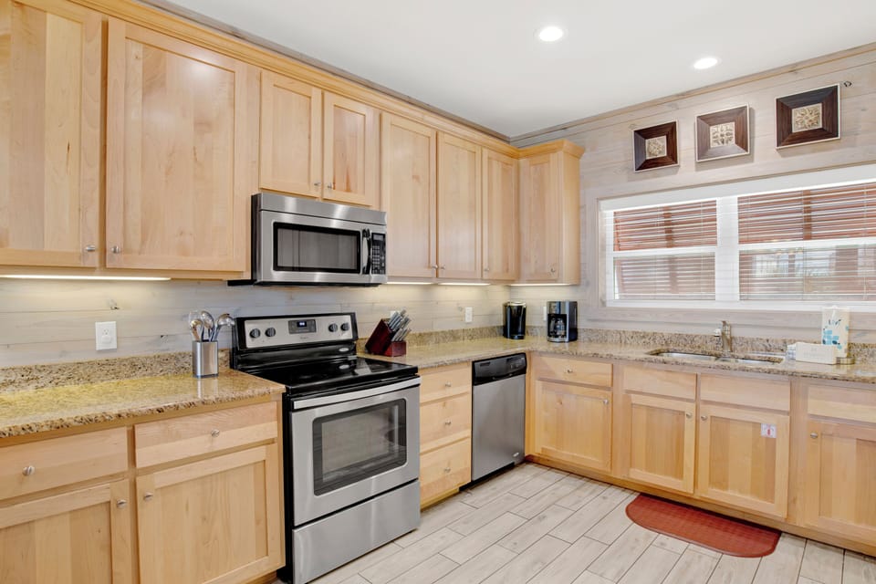 Offering a fully equipped kitchen with stainless appliances