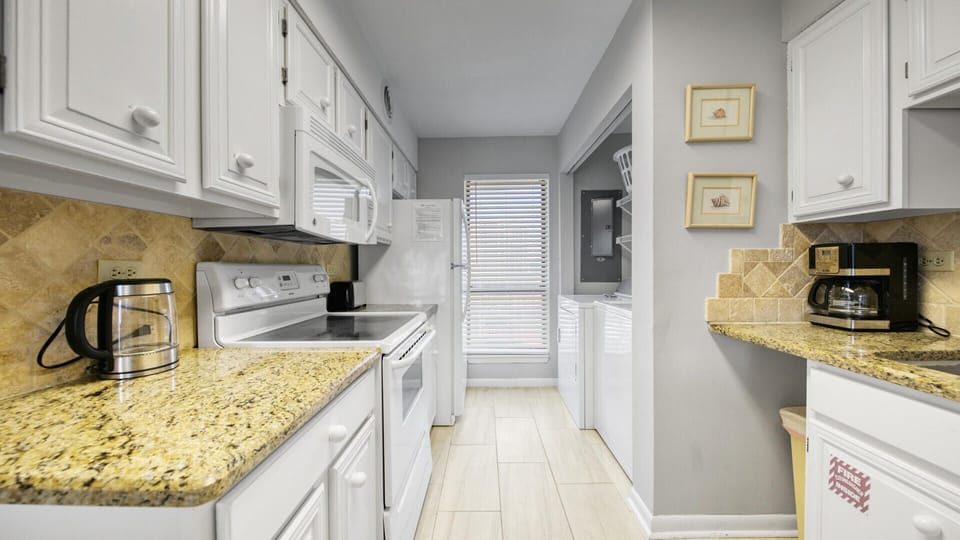 Full Size Washer and Dryer in Kitchen