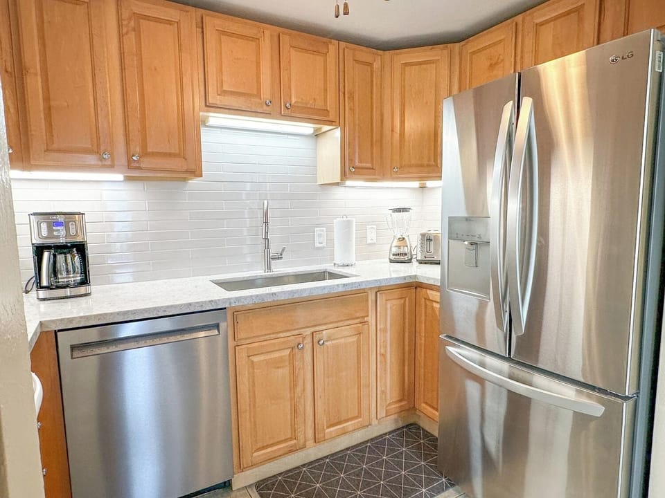 New appliances, countertops and tile make this kitchen shine.