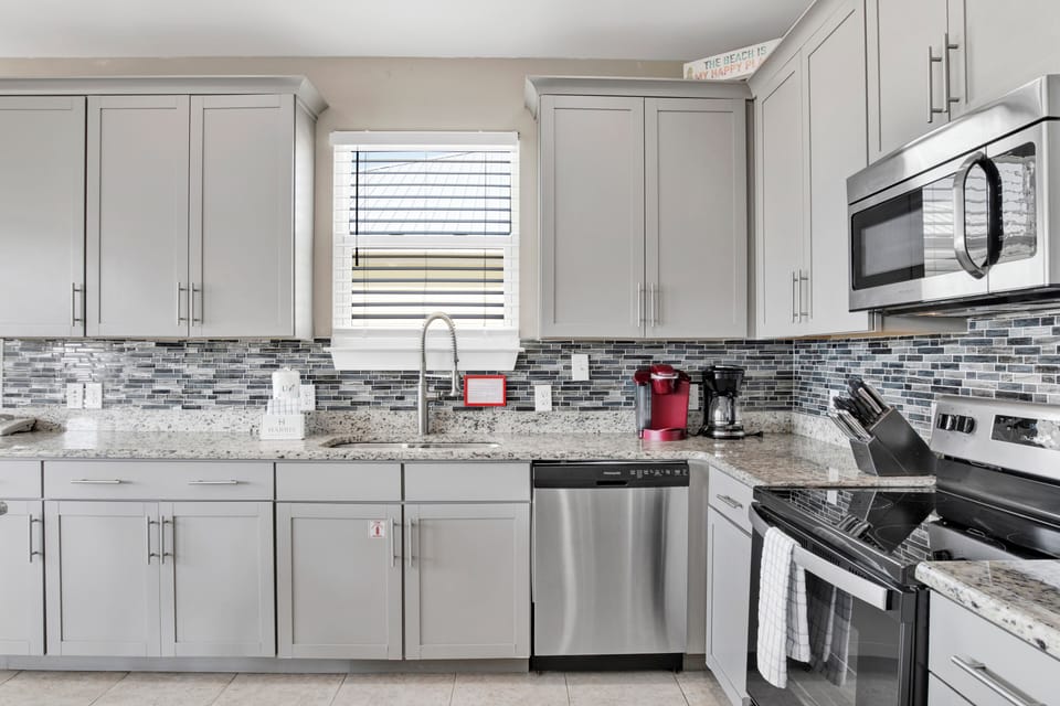 Stone counter tops and stainless steel appliances