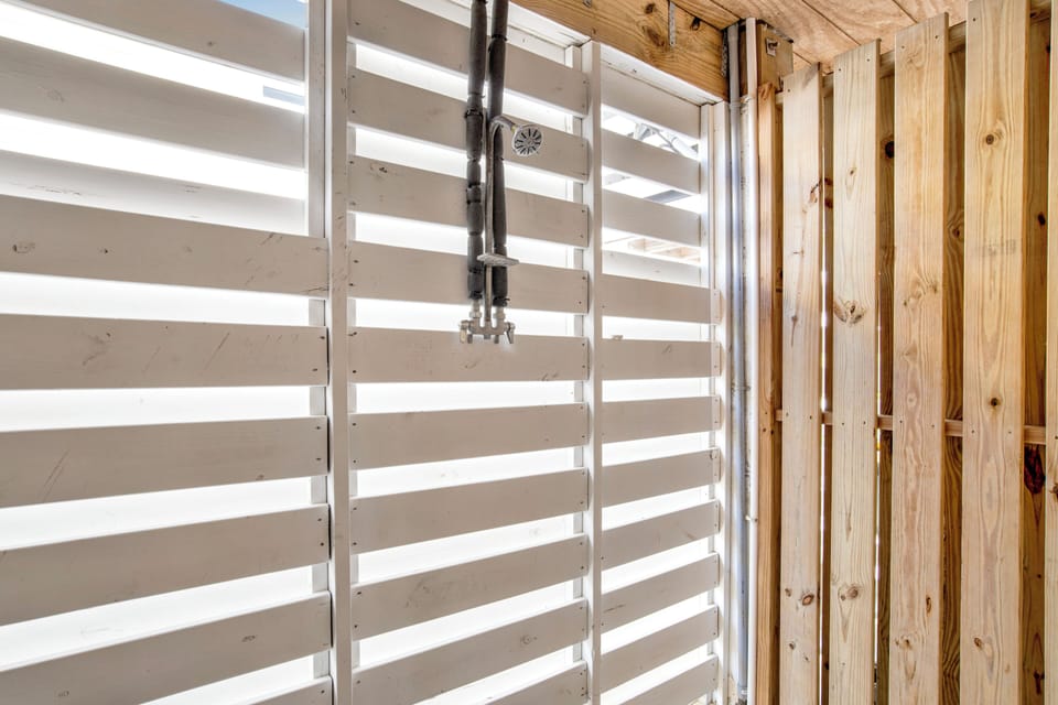 The outdoor shower is enclosed giving you privacy