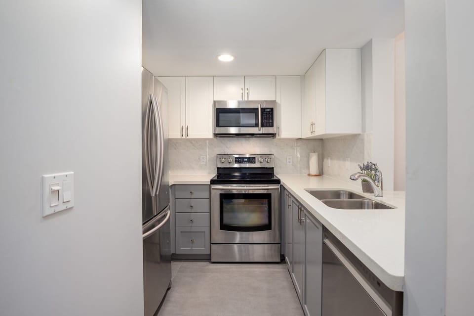Sleek and functional kitchen space, ideal for preparing meals or snacks on the go.