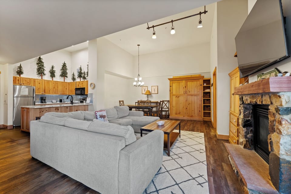 Unwind in this spacious mountain retreat with cozy fireplace, full kitchen, and rustic charm perfect for your getaway.