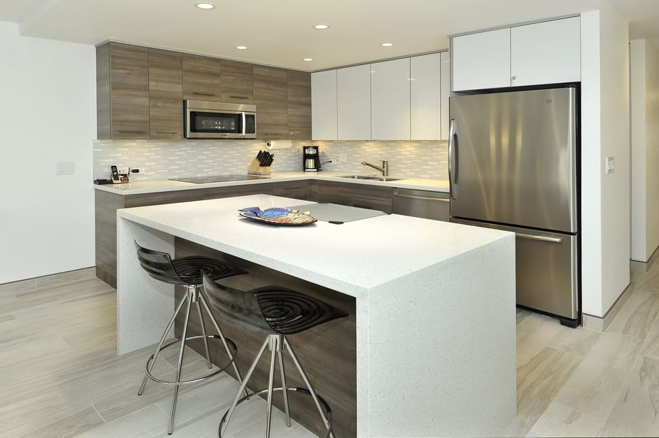 Open Concept  Kitchen With Stainless Steel Appliances