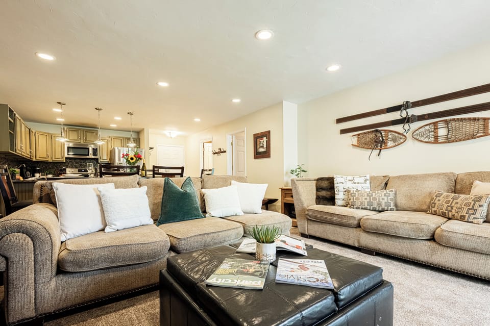 Living room with cozy furnishings, fireplace, and 47" HD TV/DVD with Wii & Xbox