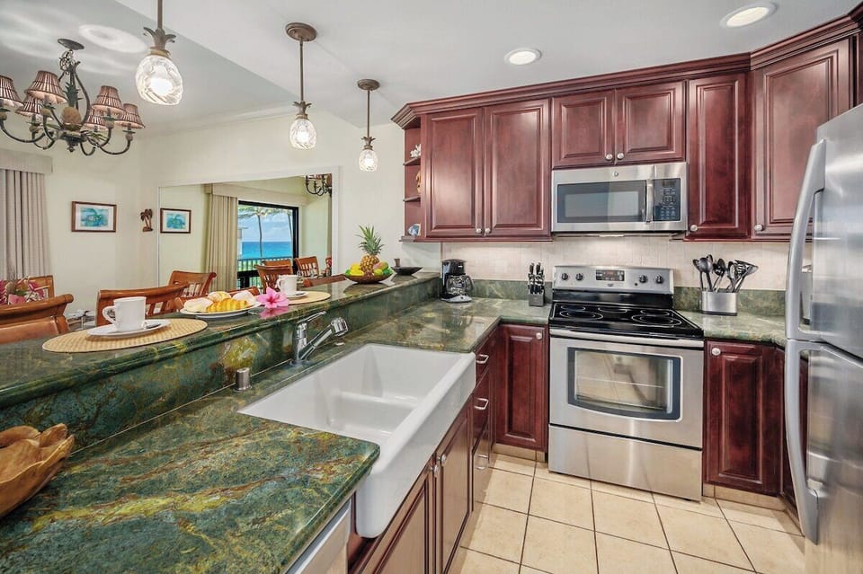 Poipu Sands 424 Renovated Kitchen with Stainless Steel Appliances