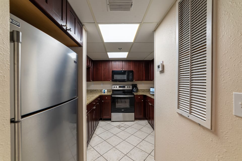 The well equipped gourmet kitchen has beautiful appliances, granite counter tops and wooden cabinets with lots of storage.  We also have both a Keurig coffee machine and a drip coffee maker.
