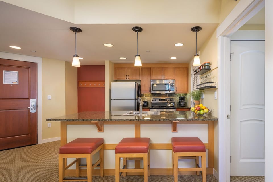 Seating for three at the breakfast bar