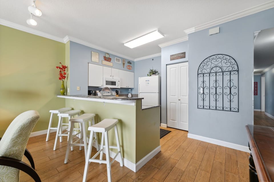 Fully stocked kitchen with bar seating