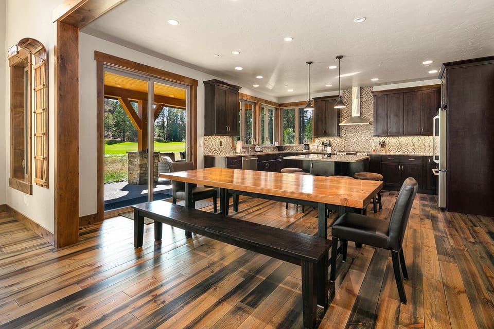Three Pines Lodge at Tipple Hill - Seating for 10 around the large dining table with 4 additional stools at the kitchen bar.