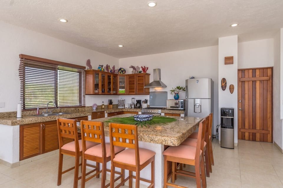 Dining Area and Kitchen - Casa Dena Tankah Tulum Mexico vacation rental