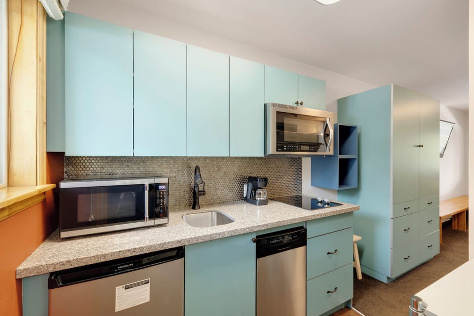 Kitchen with appliance wall