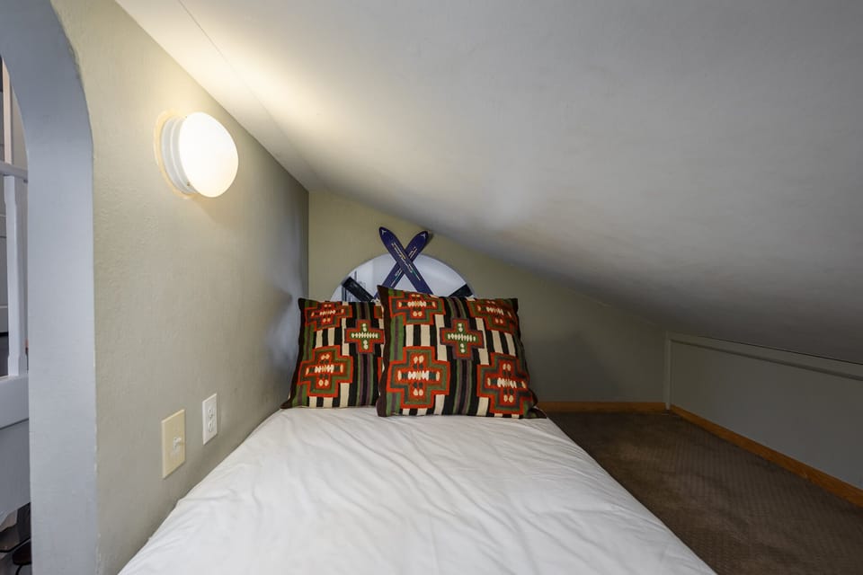 Cozy nook between main and upper level supports an additional twin bed - sleeps one child perfectly!