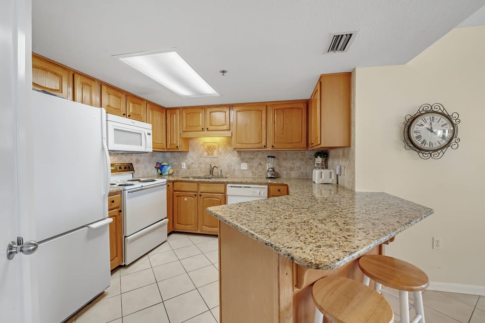 Fully Equipped Kitchen with Granite Countertops