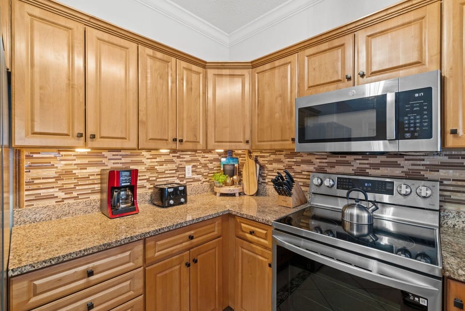 Fully Stocked Kitchen with Bar Seating