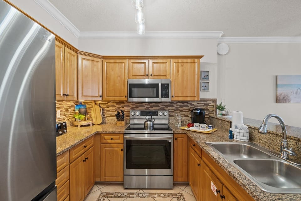 Fully Stocked Kitchen with Bar Seating