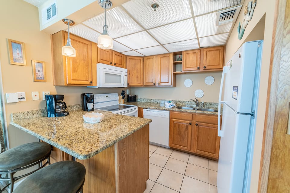 Enjoy a gourmet meal or a quick snack in your well equipped kitchen with extra seating at the bar area. We provide both Keurig and drip coffee makers.